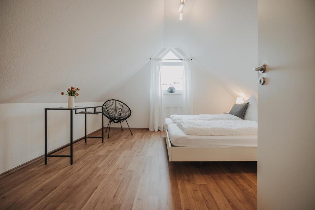 Postel nebo postele na pokoji v ubytování Ferienwohnung Weidenblick