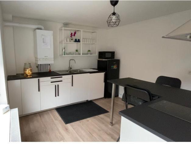 Kuchyňa alebo kuchynka v ubytovaní Maisonette Tran