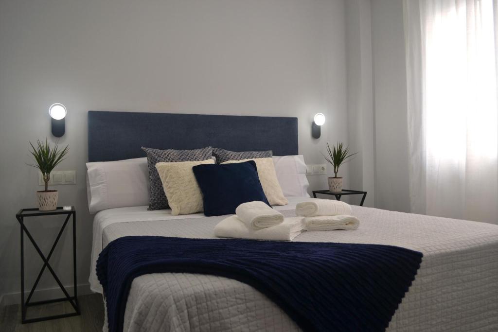 Posteľ alebo postele v izbe v ubytovaní Victoria Flat F&M Moderno, acogedor y céntrico