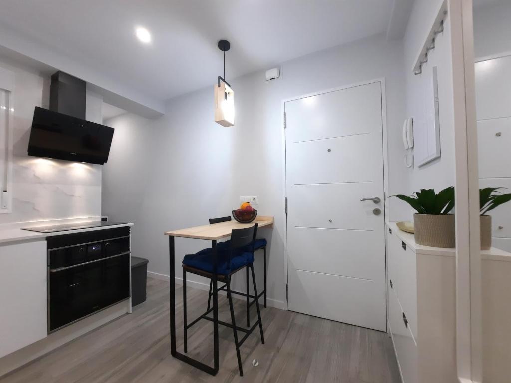 Kuchyňa alebo kuchynka v ubytovaní Victoria Flat F&M Moderno, acogedor y céntrico