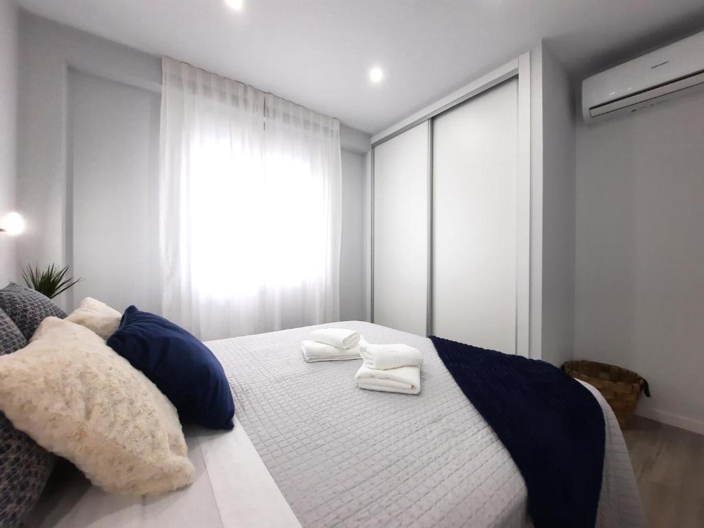 Posteľ alebo postele v izbe v ubytovaní Victoria Flat F&M Moderno, acogedor y céntrico