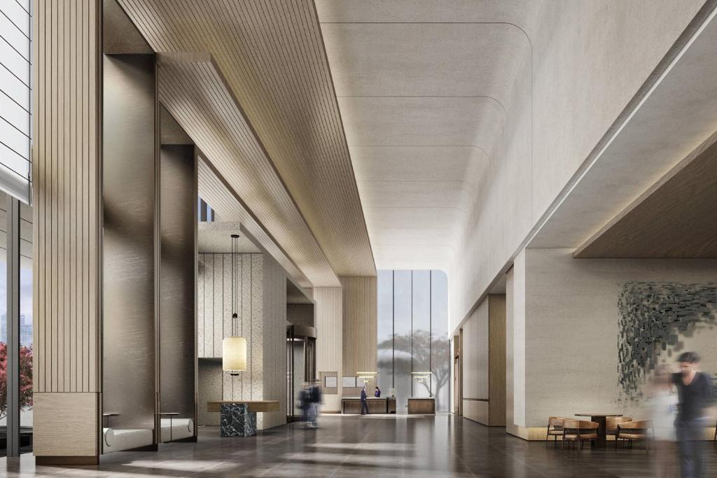 a rendering of the lobby of a building at Courtyard by Marriott Luoyang in Luoyang