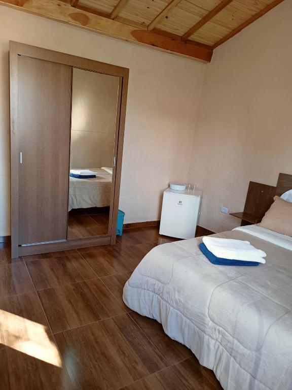 Postel nebo postele na pokoji v ubytování Suites em São Thomé das Letras