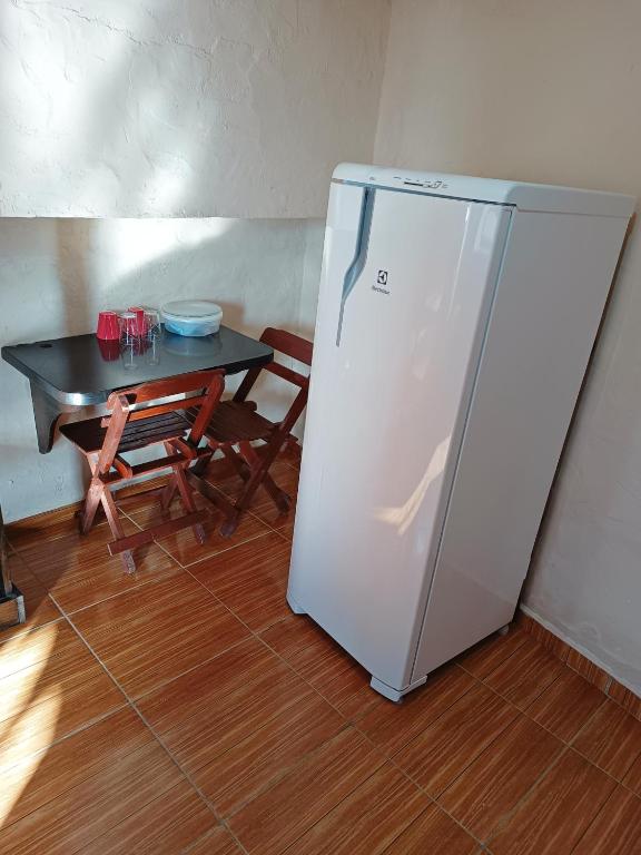 Kuchyň nebo kuchyňský kout v ubytování Suites em São Thomé das Letras