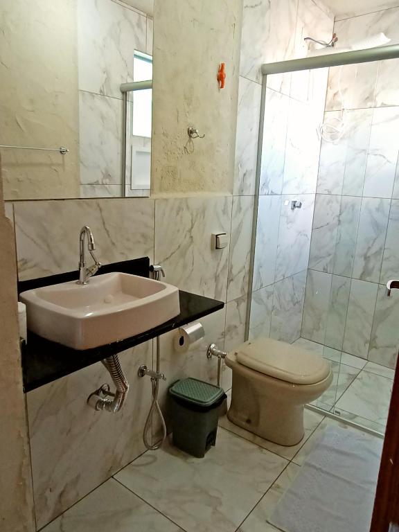 Koupelna v ubytování Suites em São Thomé das Letras