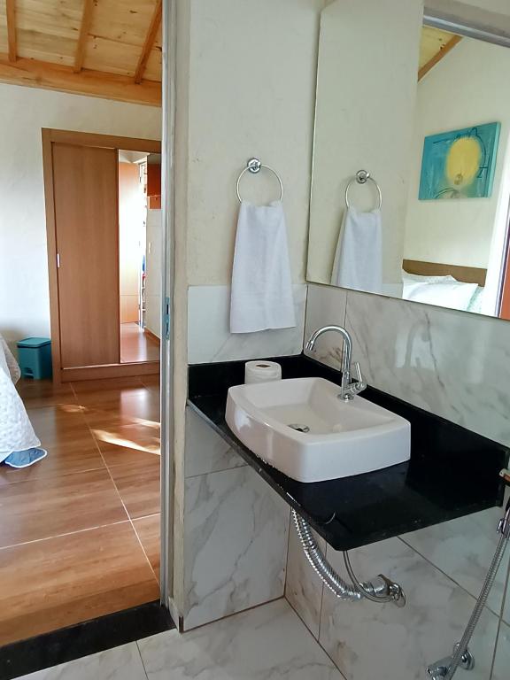 Koupelna v ubytování Suites em São Thomé das Letras