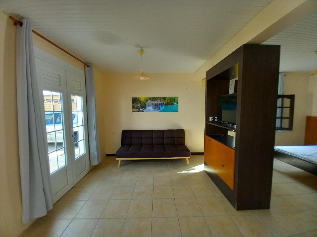 Postel nebo postele na pokoji v ubytování Vacances martinique
