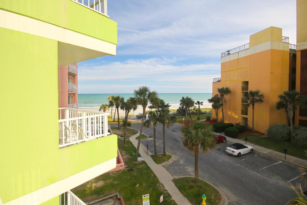 a view of the beach from a balcony of a building at Caravelle Tower #232 in Myrtle Beach