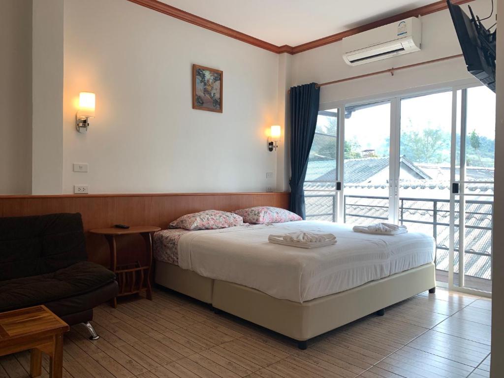 Postel nebo postele na pokoji v ubytování Eco Guesthouse A3