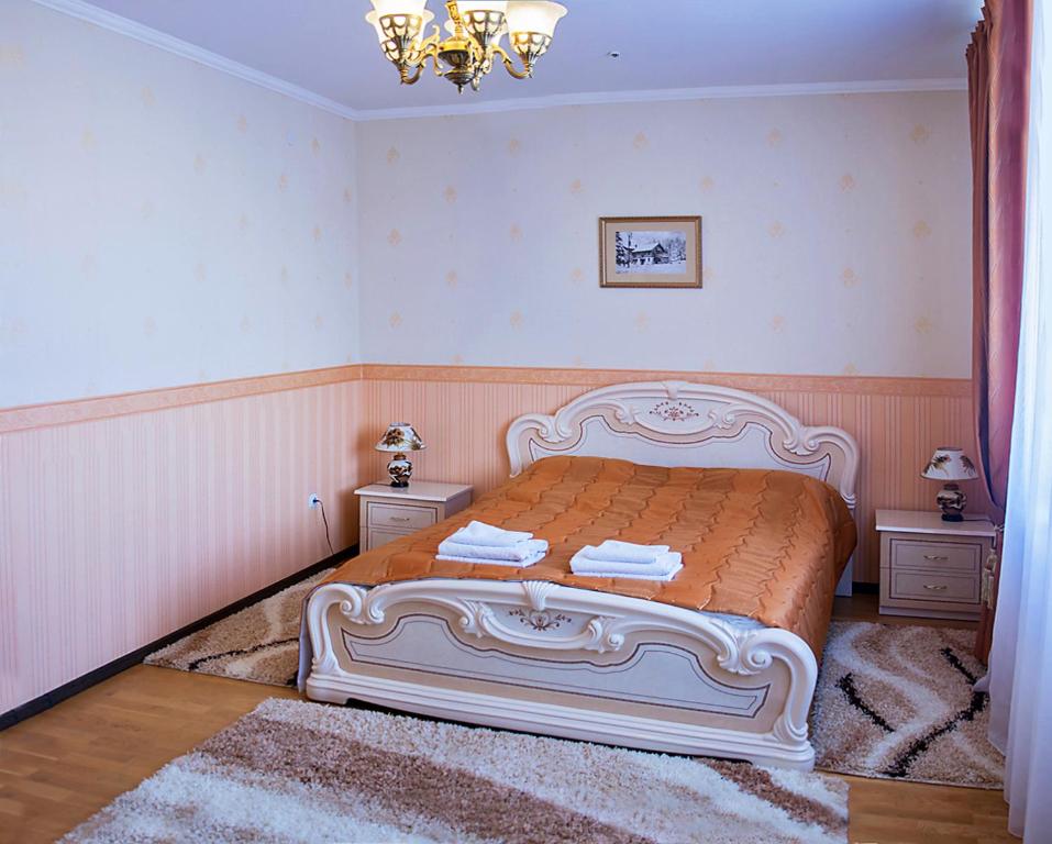 Postel nebo postele na pokoji v ubytování Hotel&Restaurant SENATOR