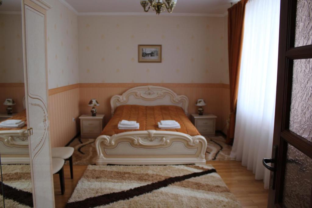Postel nebo postele na pokoji v ubytování Hotel&Restaurant SENATOR