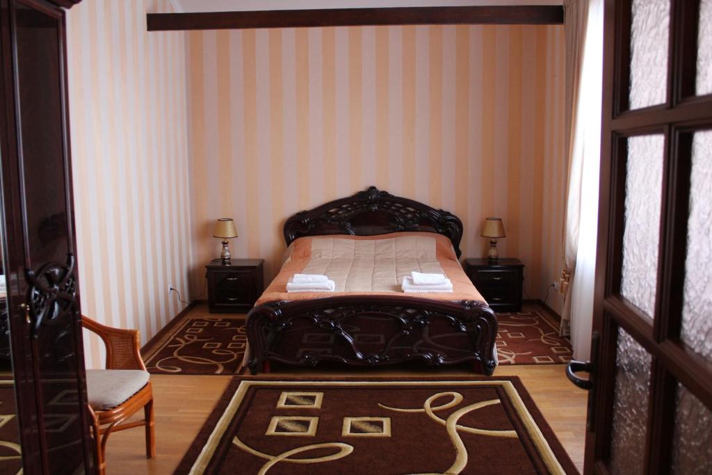 Postel nebo postele na pokoji v ubytování Hotel&Restaurant SENATOR