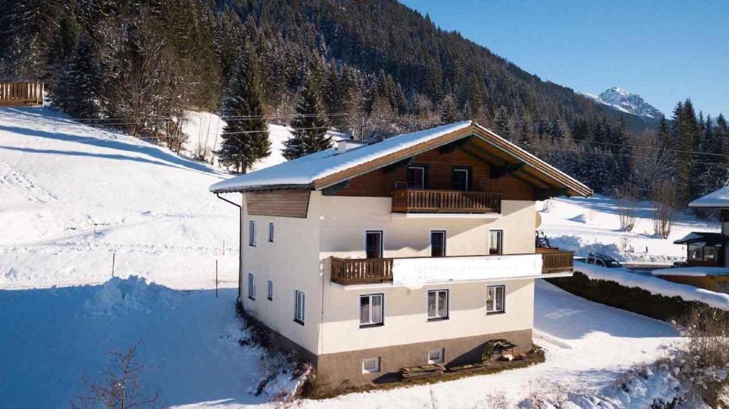 a house in the snow on a mountain at Holiday home in Radstadt - Salzburger Land 352 in Radstadt