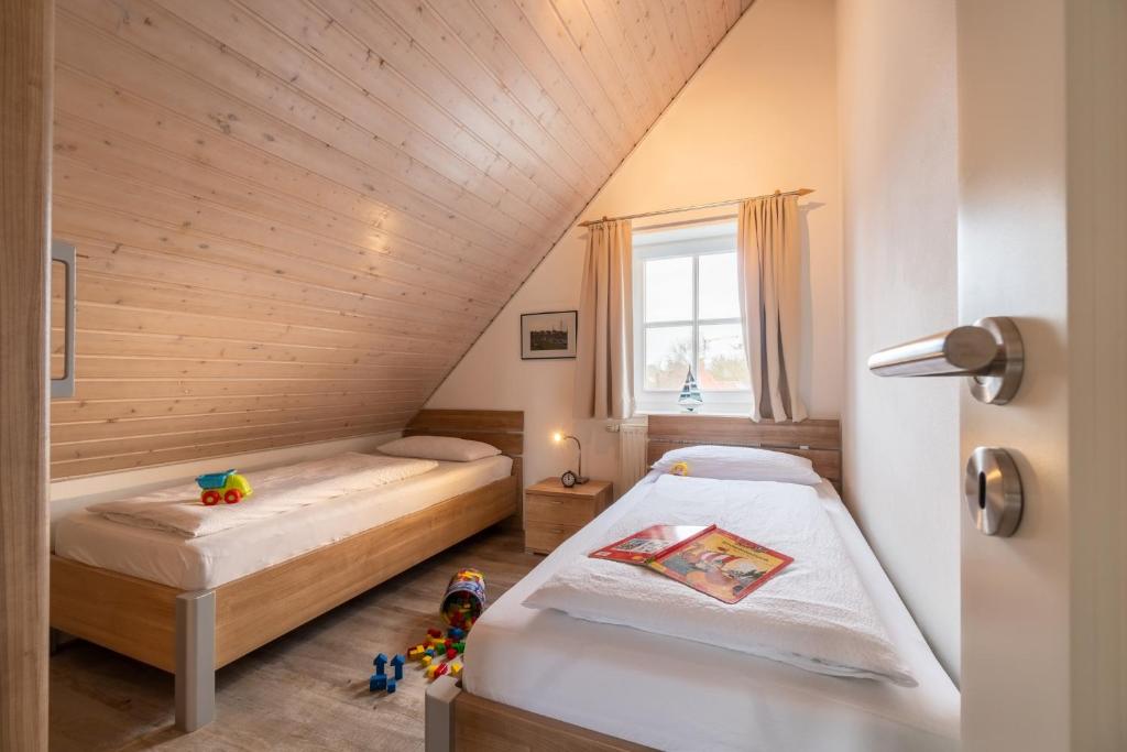 Postel nebo postele na pokoji v ubytování Kapitänskoje