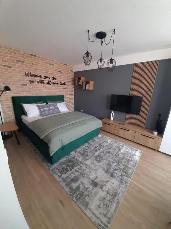 Postel nebo postele na pokoji v ubytování City Center View Studio Apartment 1