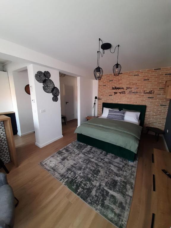 Postel nebo postele na pokoji v ubytování City Center View Studio Apartment 1