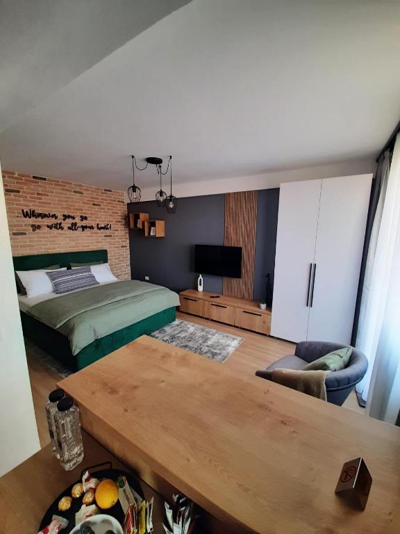 Postel nebo postele na pokoji v ubytování City Center View Studio Apartment 1