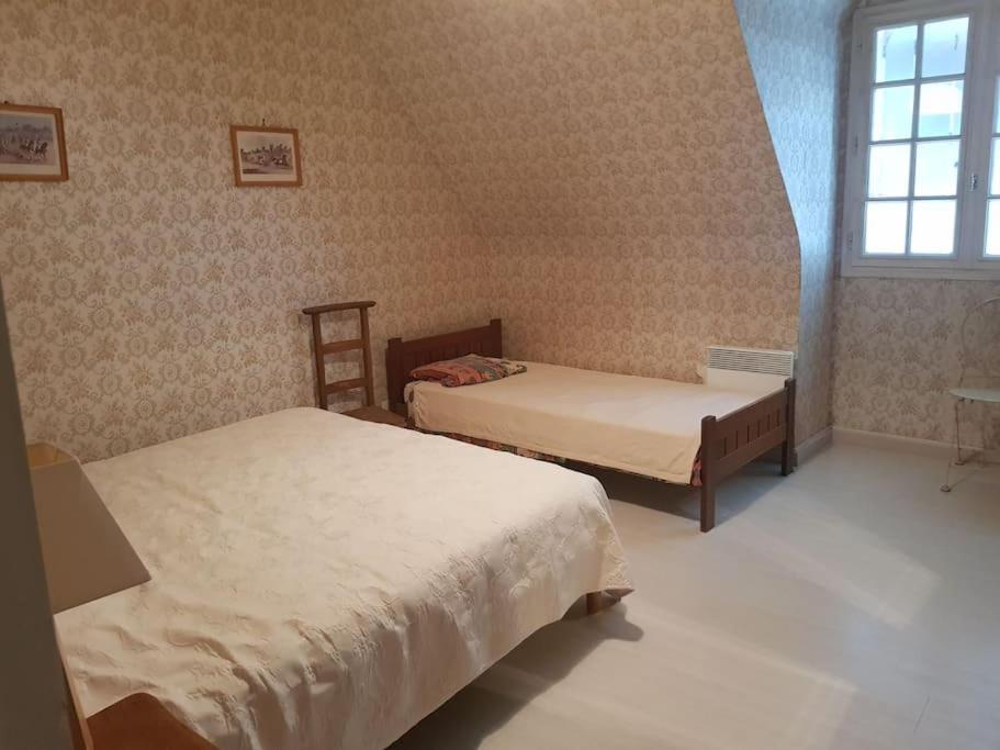 Posteľ alebo postele v izbe v ubytovaní Villa de famille 15 couchages