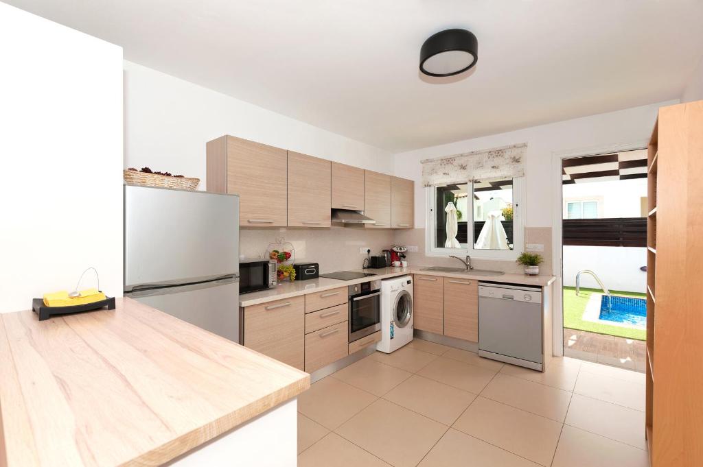 Kuchyň nebo kuchyňský kout v ubytování Villa Anais