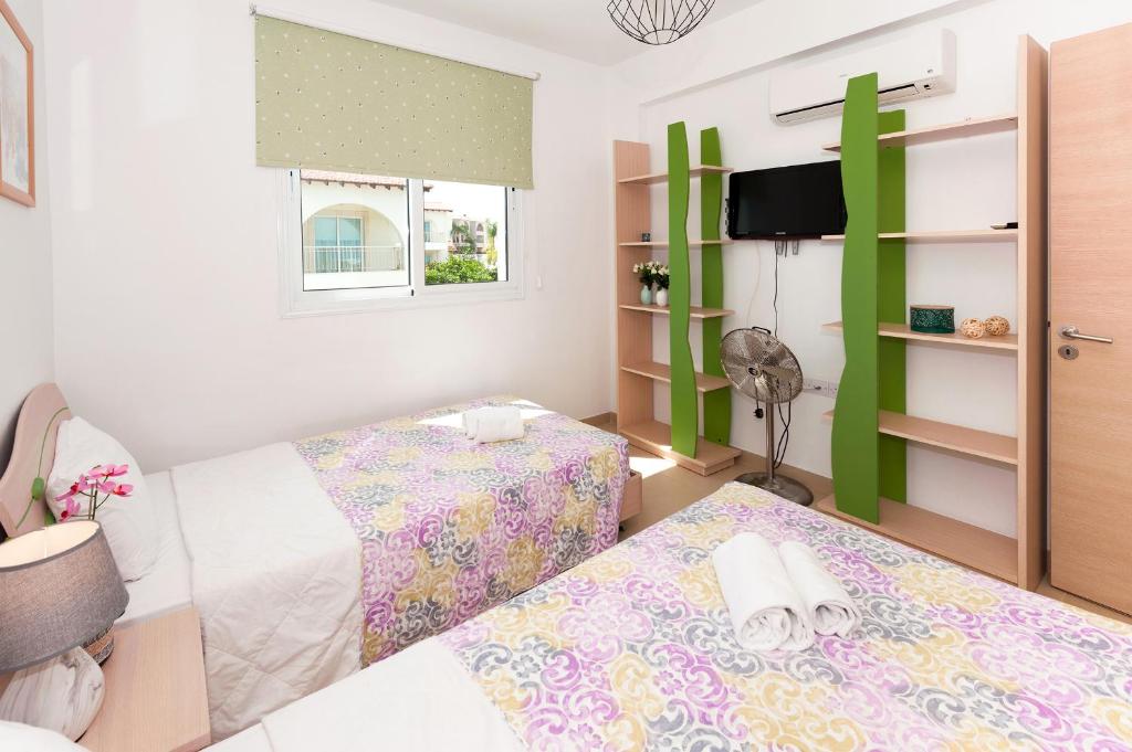 Postel nebo postele na pokoji v ubytování Villa Anais