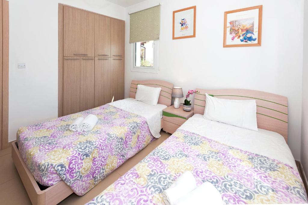Postel nebo postele na pokoji v ubytování Villa Anais
