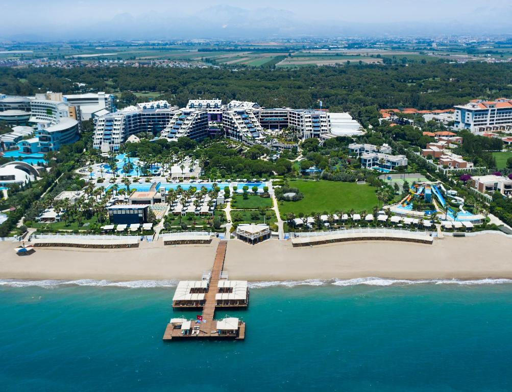 an aerial view of a resort on a beach at Susesi Luxury Resort in Belek