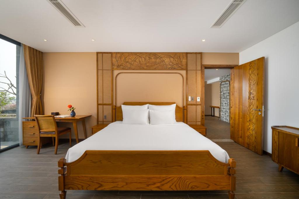Giường trong phòng chung tại VernalHome Boutique Danang