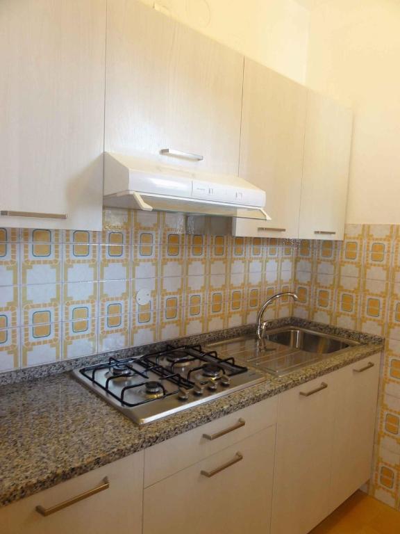 A kitchen or kitchenette at Holiday home in Bibione 36388
