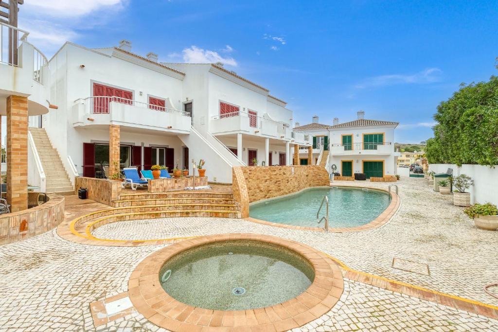 an image of a house with a swimming pool at Casa Luna, Burgau - Luz, Lagos in Burgau