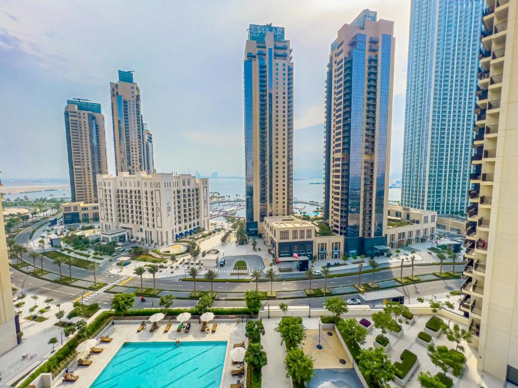 a view of a city with tall buildings at FAM Living - Creek Horizon - 3B with Kids Room in Dubai