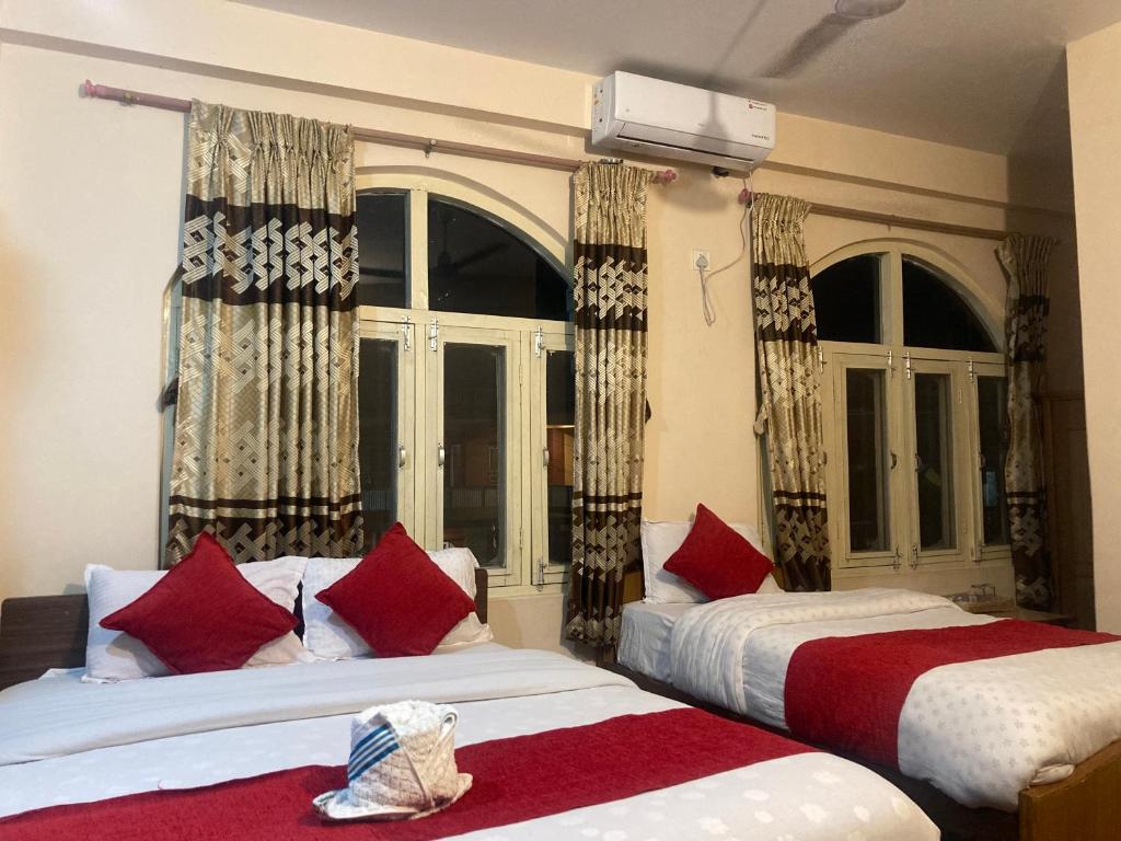 Letto o letti in una camera di Hotel Nightingale