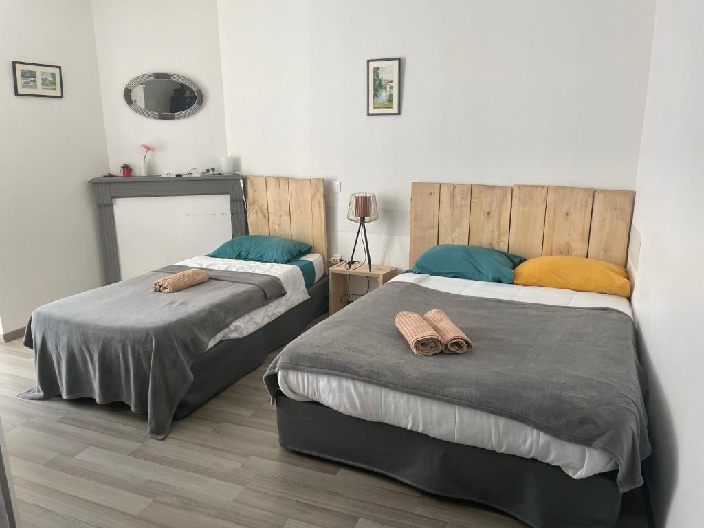 Postel nebo postele na pokoji v ubytování Gîte:"sur le chemin"