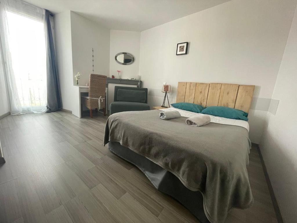 Postel nebo postele na pokoji v ubytování Gîte:"sur le chemin"