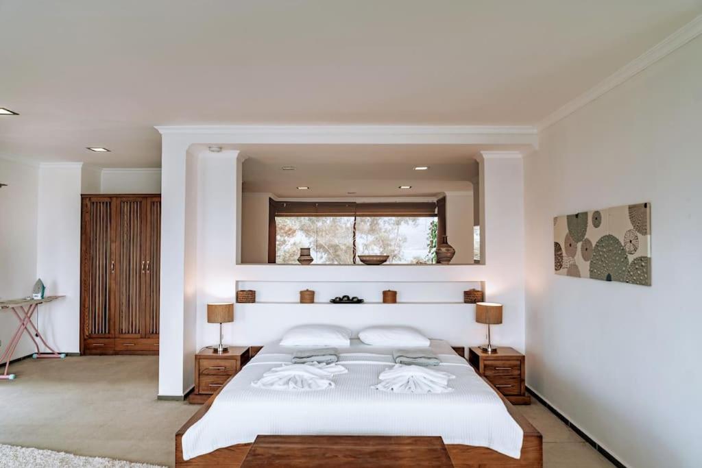 A bed or beds in a room at Casa Punto