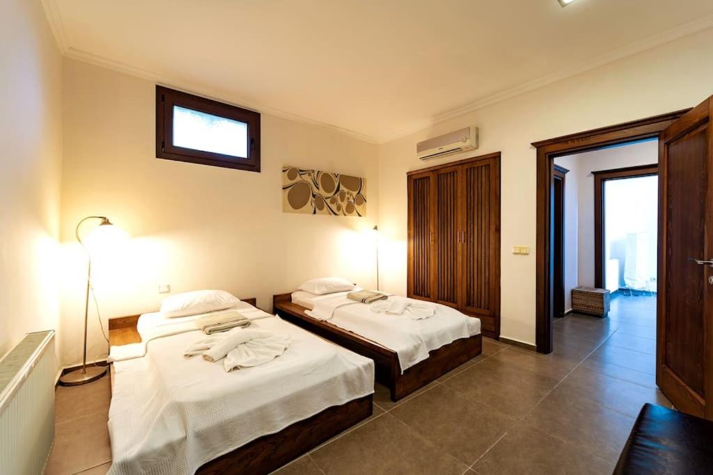 A bed or beds in a room at Casa Punto