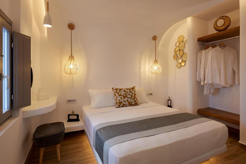 Postel nebo postele na pokoji v ubytování Allure Breeze Suites