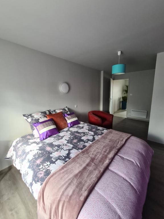 Letto o letti in una camera di L'Udon-Thani gîte de groupe à 4 min du Puy du Fou