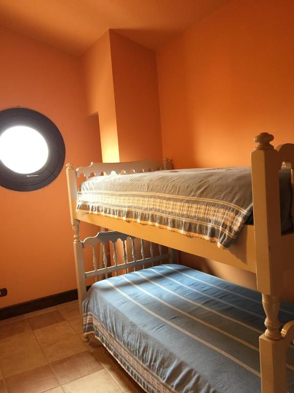 Postel nebo postele na pokoji v ubytování B&B Rollo Garden