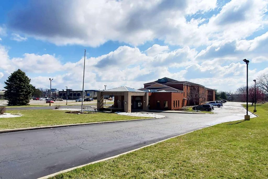 a building on the side of a street at Wingate by Wyndham Canton-Hall of Fame in Canton