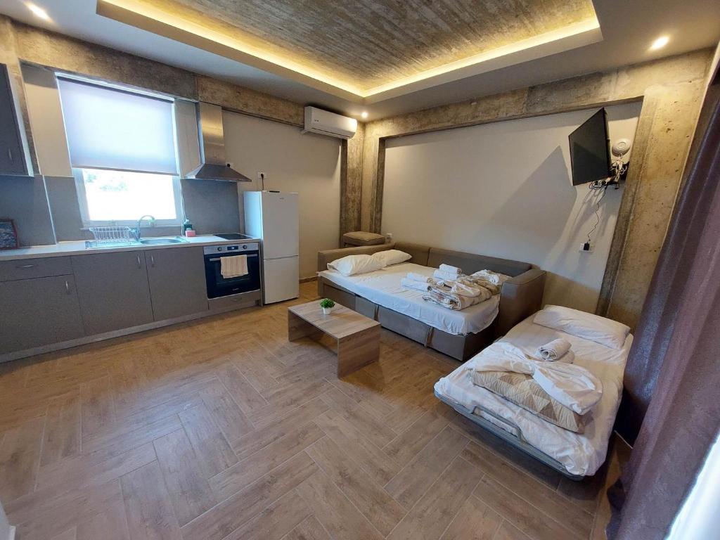 Postel nebo postele na pokoji v ubytování Kochylari Apartments