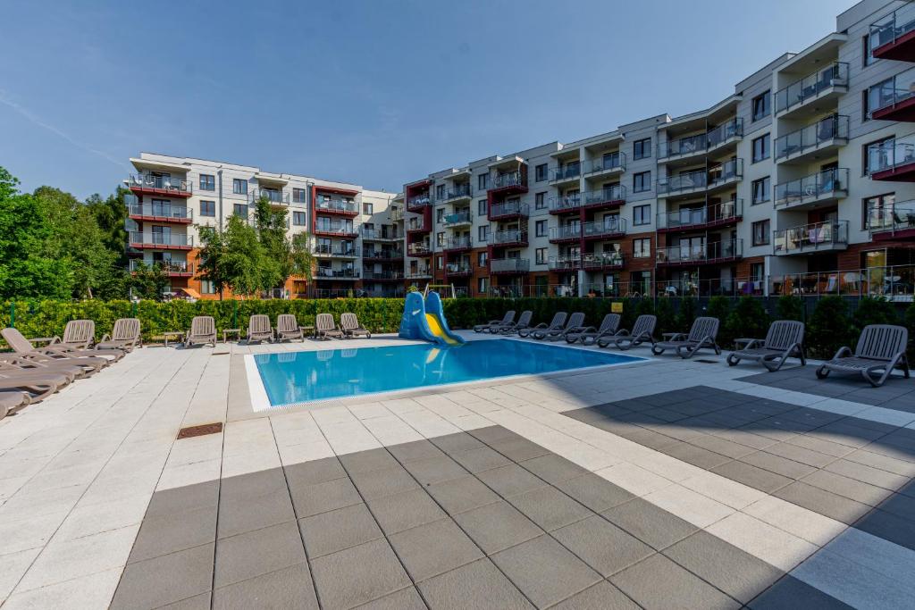 Bazén v ubytovaní Pool & Leisure Apartament Polanki Park alebo v jeho blízkosti