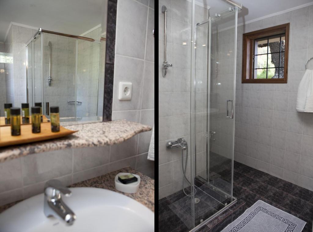 łazienka z przeszkloną kabiną prysznicową i umywalką w obiekcie Aori Hillside Villa w mieście Kántanos