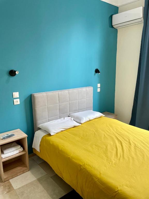 Postel nebo postele na pokoji v ubytování Hotel Kastoria