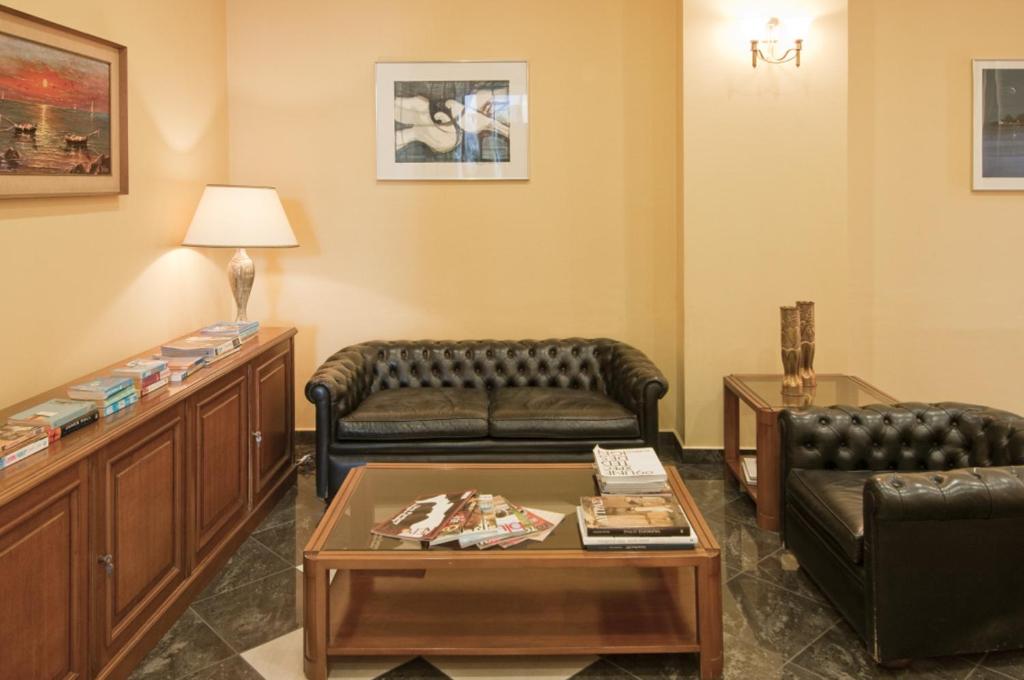 Posezení v ubytování Alexandra Hotel&Apartments