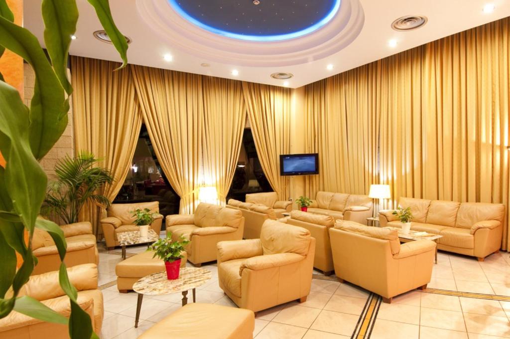 Posezení v ubytování Alexandra Hotel&Apartments