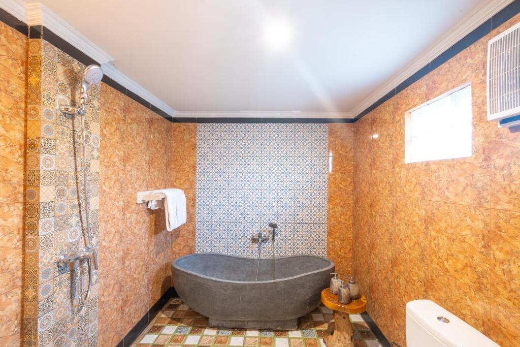 Koupelna v ubytování Uma Sebatu Villa