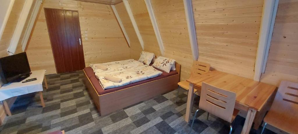 Postel nebo postele na pokoji v ubytování Penzion Svojanov