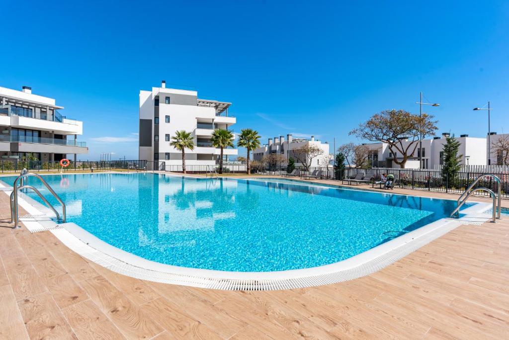Bazén v ubytovaní Seaview apartment with heated pool by Costarentals - Ref M21 alebo v jeho blízkosti