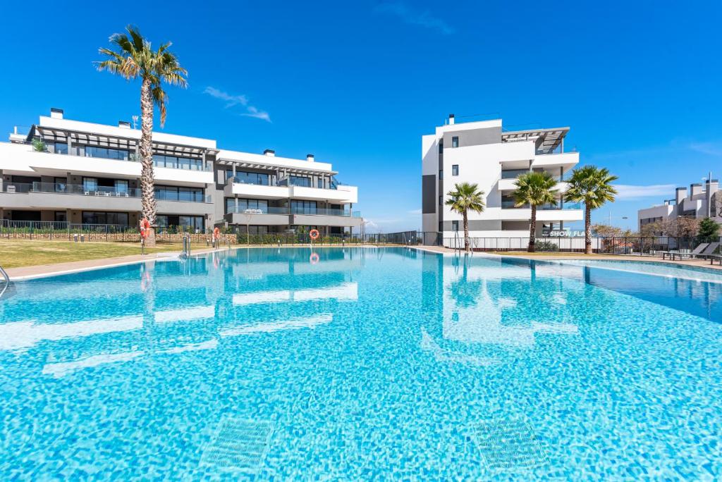 Bazén v ubytovaní Seaview apartment with heated pool by Costarentals - Ref M21 alebo v jeho blízkosti