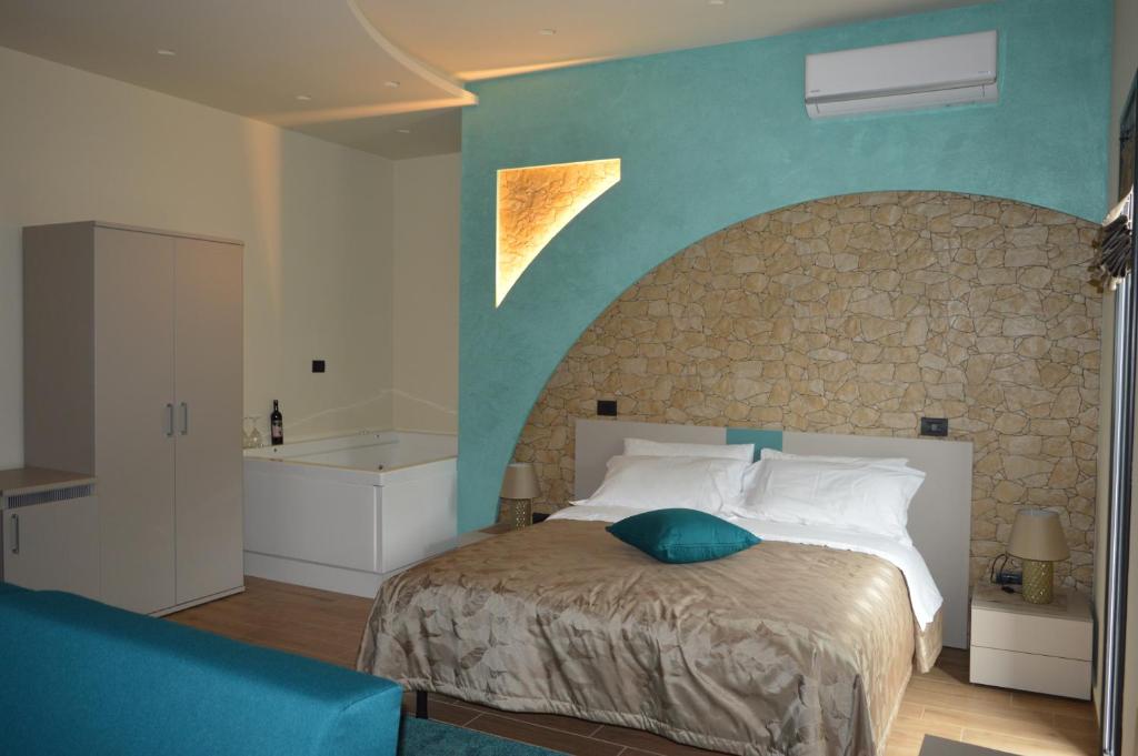 Posteľ alebo postele v izbe v ubytovaní B&B Dimora dell' Etna